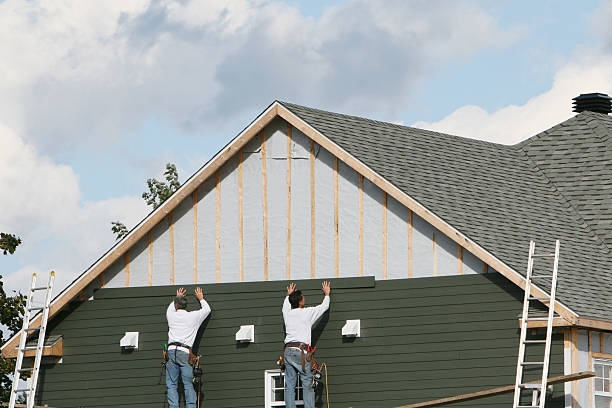 Professional Emergency Siding Repair technician working in Lowgap, NC